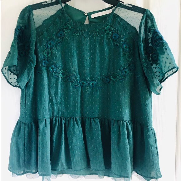 peplum embroidered tops